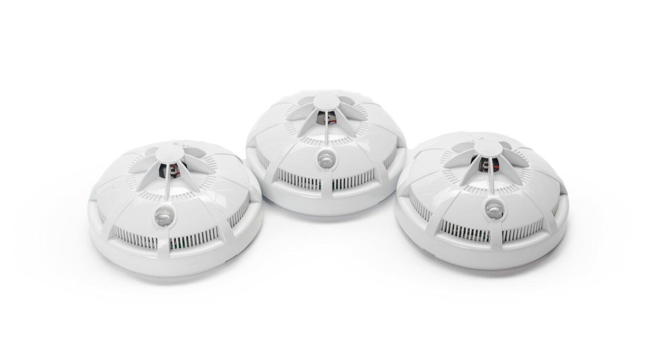 Smoke alarm isolated on white